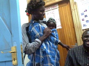 Helen and Jeff (and half of Daniel) at the clinic