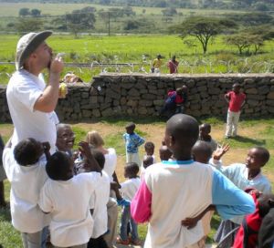 Paul blowing bubbles at Springs of Hope Kenya